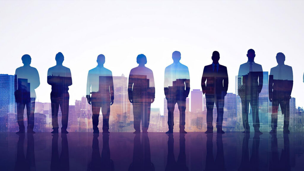 Silhouettes of nine businesspeople standing in front of a city skyline, depicted with a double exposure effect.
